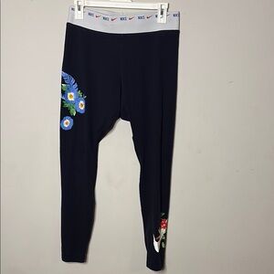 Nike Women's Navy Leggings with Floral Design